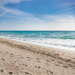 Miami Beach, Florida. Empty sandy beach in the early morning near the ocean.