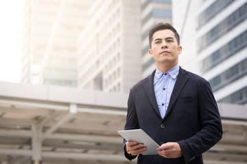 Business man and tablet