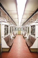 Subway car with empty seats. Empty subway.