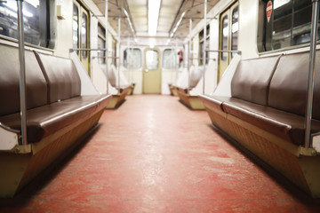 Subway car with empty seats. Empty subway.
