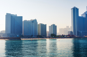Fototapeta na wymiar Ajman Corniche Beach beautiful coast in the city downtown area