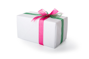 Present wrapped in white paper decorated with red and green ribbon. Isolated, clipping path