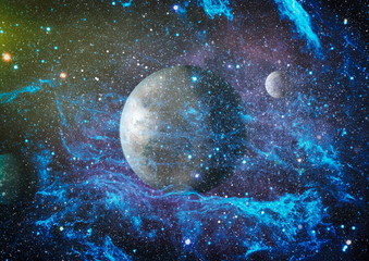 Stars of a planet and galaxy in a free space. Elements of this image furnished by NASA .