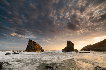 Sea sunrise, near the rocks