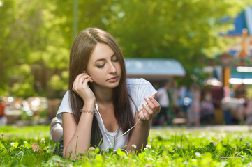 Fototapeta premium Attractive Brunette Female in Park Outdoors.