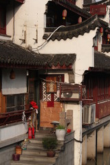 Riverside entrance to a residential home and restaurant of ancient architectural design in the old town of Shanghai, China