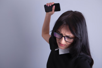 businesswoman phone angry fist