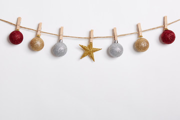 Christmas Decoration Hanging with Robe on White Background.Flat Lay,Top View