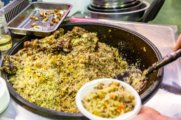 Pilaf is a Traditional dish from Central Asia, cooked from rice with lamb.
