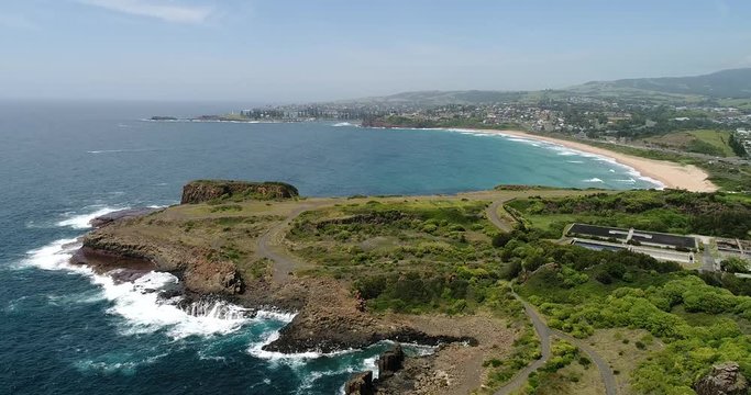 Scenic seascape around Bombo Quarry headland &ndash; site of geological hexagonal basalt pinnacle rocks on shores of pacific ocean.
