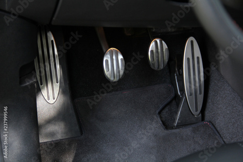 Car pedals. Gas, clutch and brake.