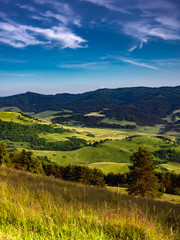 Fototapeta na wymiar Valley between Spis Magura and Pieniny Mountains Range. View from Wysoki Wierch (Slachtovsky) Mount.