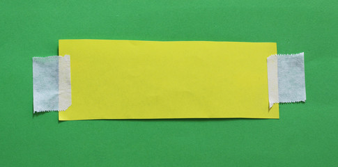 ripped paper with adhesive tape