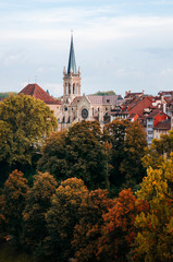 Fototapeta na wymiar Nydeggkirche Protestant church among autumn tree Bern - Switzerland