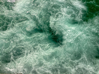 surf with swirling water as background