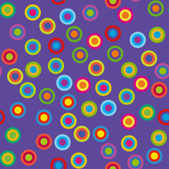 Colorful psychedelic circles on a violet background.