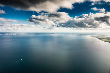 The bridge between Denmark and Sweden viewed from a plane, on a day with no wind