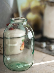 Empty three-liter jar stands on the tabletop