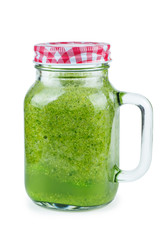 Glass of homemade spinach and broccoli smoothie