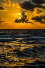 Orange sunset with reflection over Atlantic ocean, Miami, Florida, USA