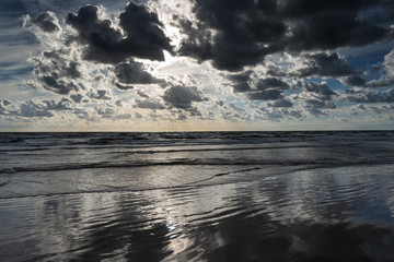 Fototapeta na wymiar Scattered clouds over Baltic sea.