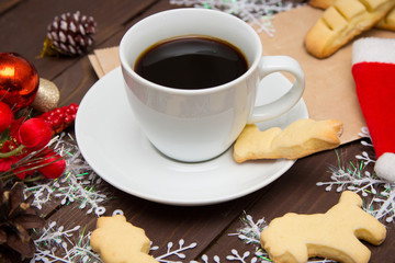 Cup of coffee with cookies on Christmas morning, a special toning. Christmas template.