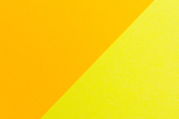 Yellow and orange color texture paper background. Geometric paper background, pastel colors .
