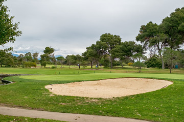 golf course with players in the background