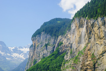 Alpine peaks landskape. Lauterbrunnen, Jungfrau, Bernese highland. Alps, tourism, journey, hiking concept.