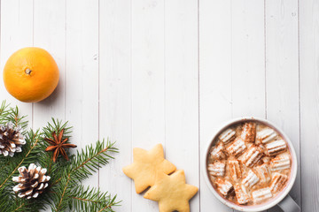 Christmas composition. Hot chocolate cookies, pine branches, cinnamon sticks, anise stars. Christmas, winter concept. Flat lay, top view