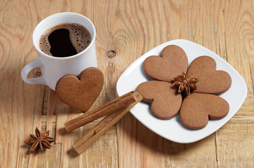 Heart shaped ginger cookies, coffee and spice