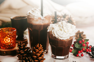 Tasty winter coffee with cream, winter holidays concept