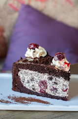 Drunk Cherry cake with chocolate and cherry mix on white plate