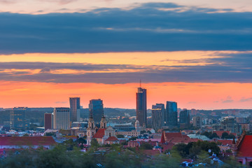 Aerial view over Old town of Vilnius and skyscrapers of New Center at sunrise, Lithuania, Baltic states.