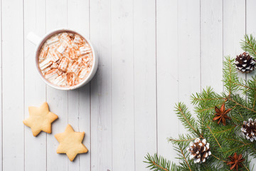 Christmas composition. Hot chocolate cookies, pine branches, cinnamon sticks, anise stars. Christmas, winter concept. Flat lay, top view