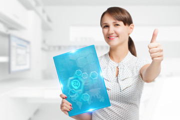 The concept of business, technology, the Internet and the network. A young entrepreneur working on...