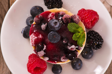 Cheesecakes with mixed berries.