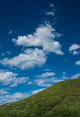 Clouds over hill