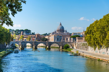 Saint Peter dome seen from Tiber river in Rome - obrazy, fototapety, plakaty