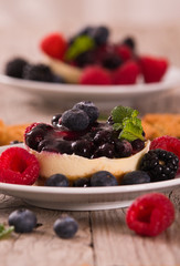 Cheesecakes with mixed berries.