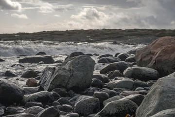 rocks along the sea a cold autumn day