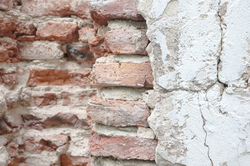Closeup on brick crack old ancient vintage antique wall with beautiful texture and surface for history background.