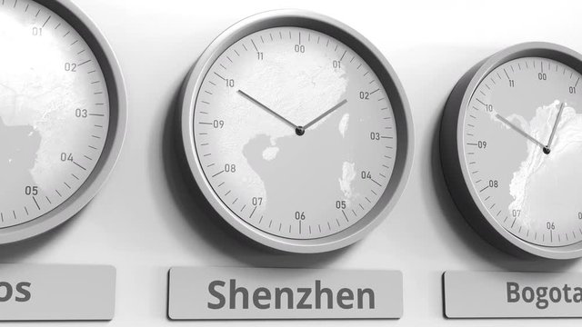 Round clock showing Shenzhen, China time within world time zones. Conceptual 3D animation