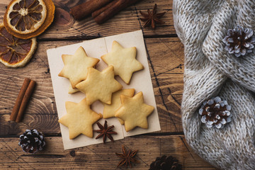 Christmas composition. Hot chocolate and cookies, pine branches, cinnamon sticks and anise stars. Christmas winter concept. Flat lay top view