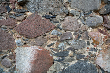 Original textured surface of of a natural coarse stone