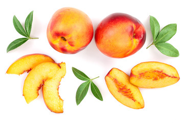 ripe nectarine with leaves isolated on white background. Top view. Flat lay pattern