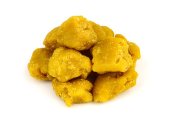 Asafoetida Dried Resin Gum Medicinal Cure and Culinary Spice, Isolated on White Background. Also Known as Food of the Gods, Devil's Dung, Jowani Badian, Hing, Hengu, Inguva, Kayam, and Ting.