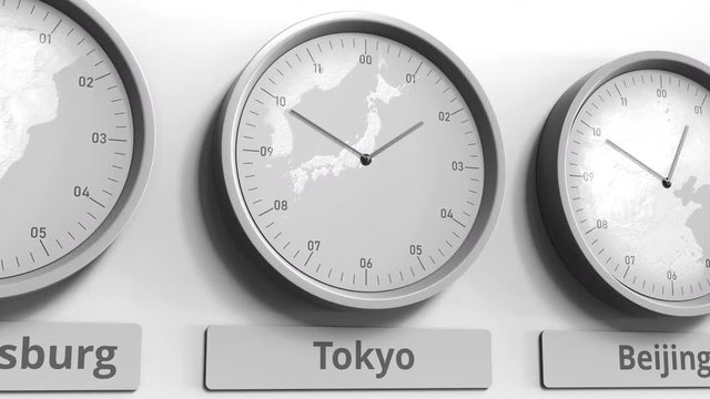 Clock shows Tokyo, Japan time among different timezones. Conceptual 3D animation