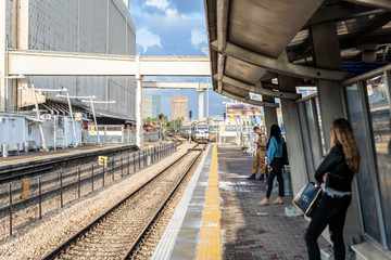 Intercity passenger train arrives at the Mirkaz Shmona railway station platform in Haifa, Israel