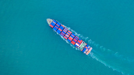 Aerial view cargo container ship carrying container for import and export, business logistic and...